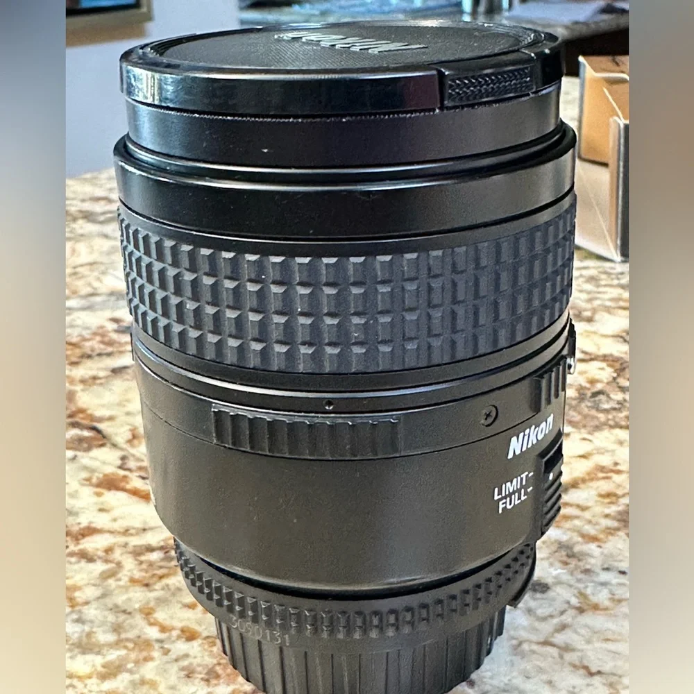 Used Nikon AF 60mm Micro 2.8 w caps UV pro lens filter like new